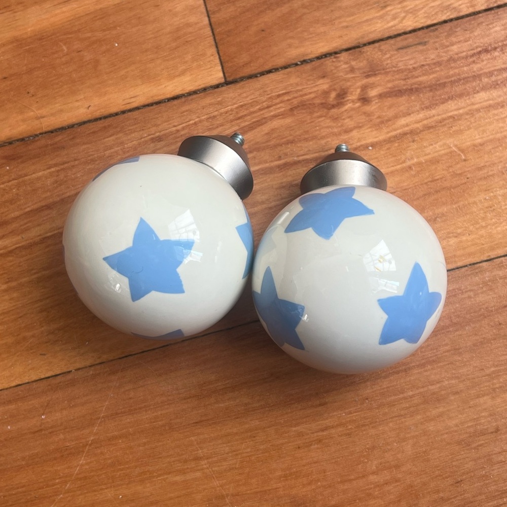 Pottery Barn white with light blue star Finials